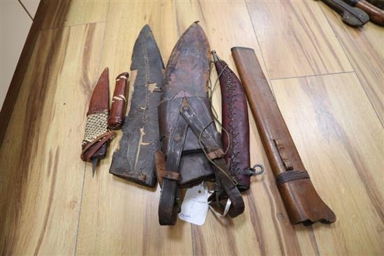Three kukris, a kris and other daggers or knives, longest item 41cm